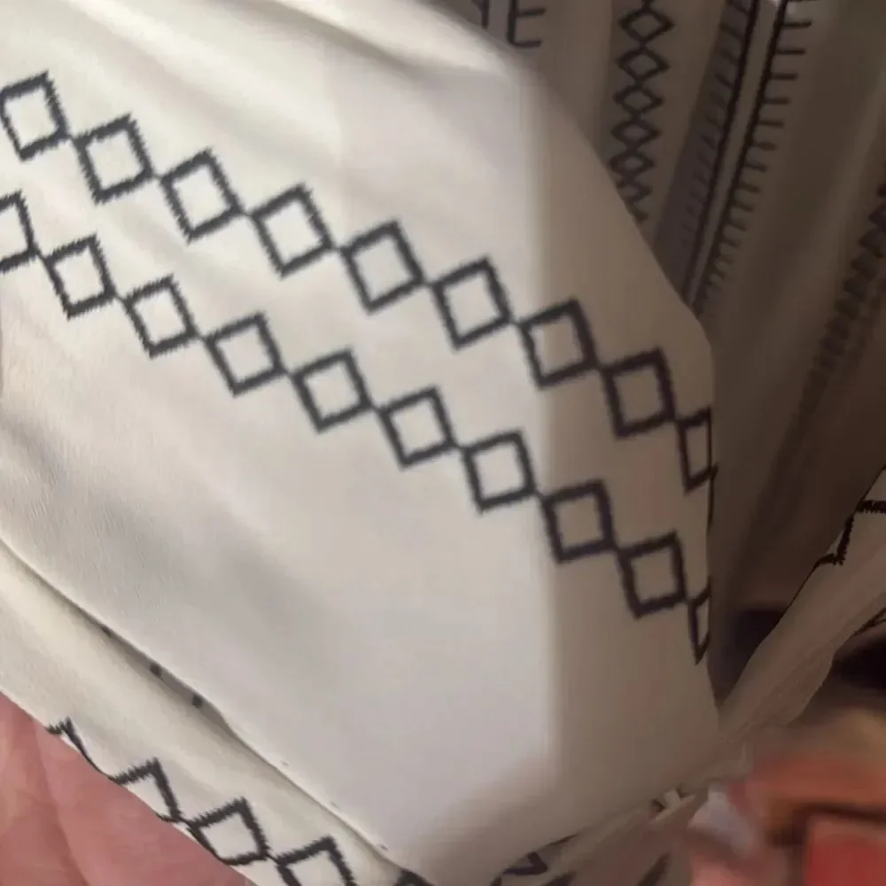 Like New WHBM Sleeveless Contrast Black Stitch White Top